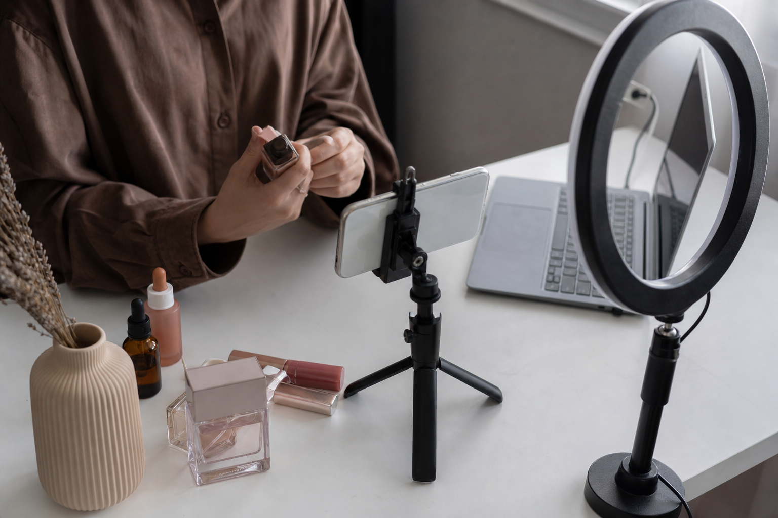 Simple UGC filming setup with phone, tripod, and everyday products